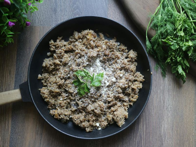 delicious cauliflower rice dish garnished with fresh herbs, perfect fo image